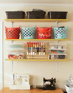 Use busted tape measures to decorate shelves - choose-to-thrive.com
